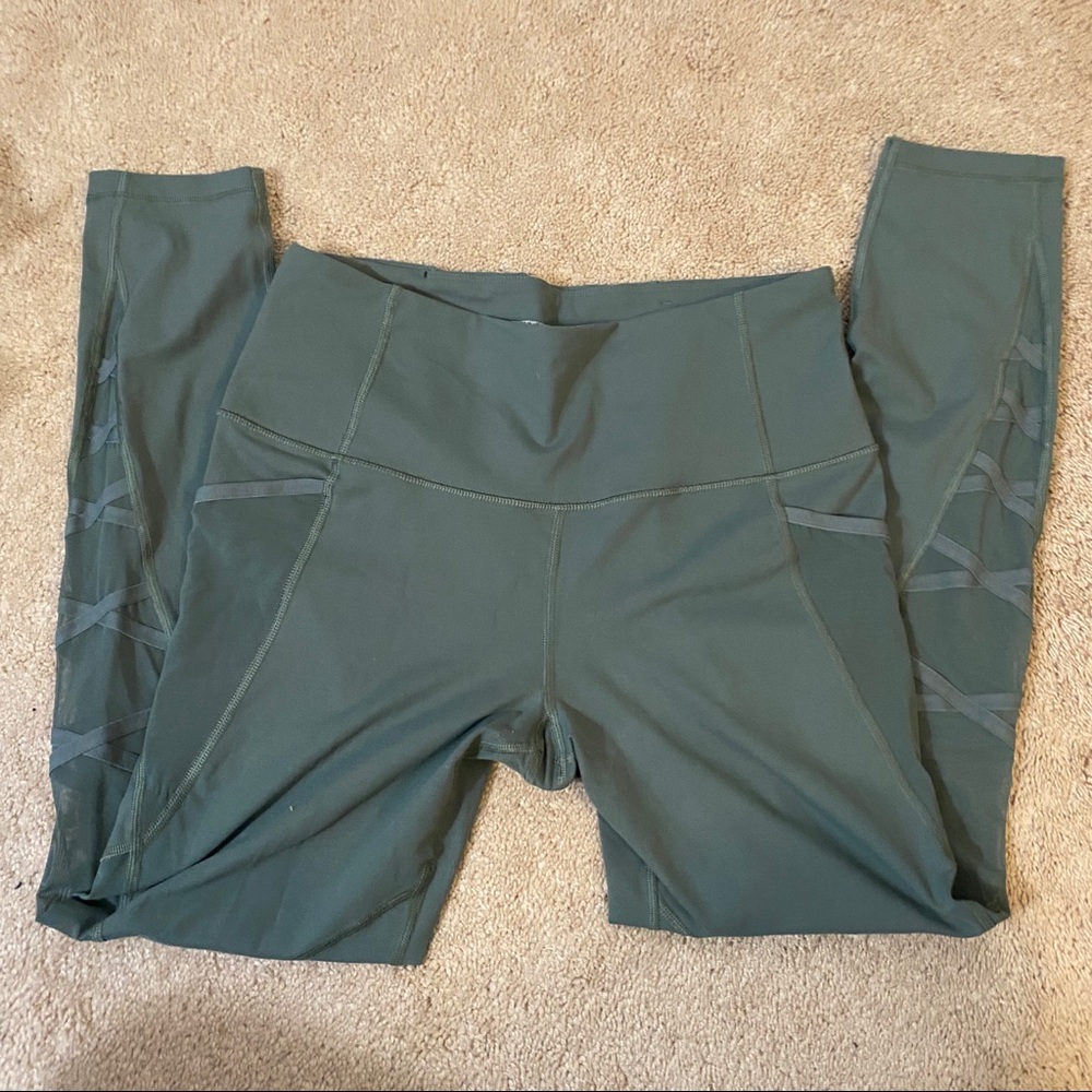 Victoria Secret Sport Knockout Leggings with criss cross leg design mossy green